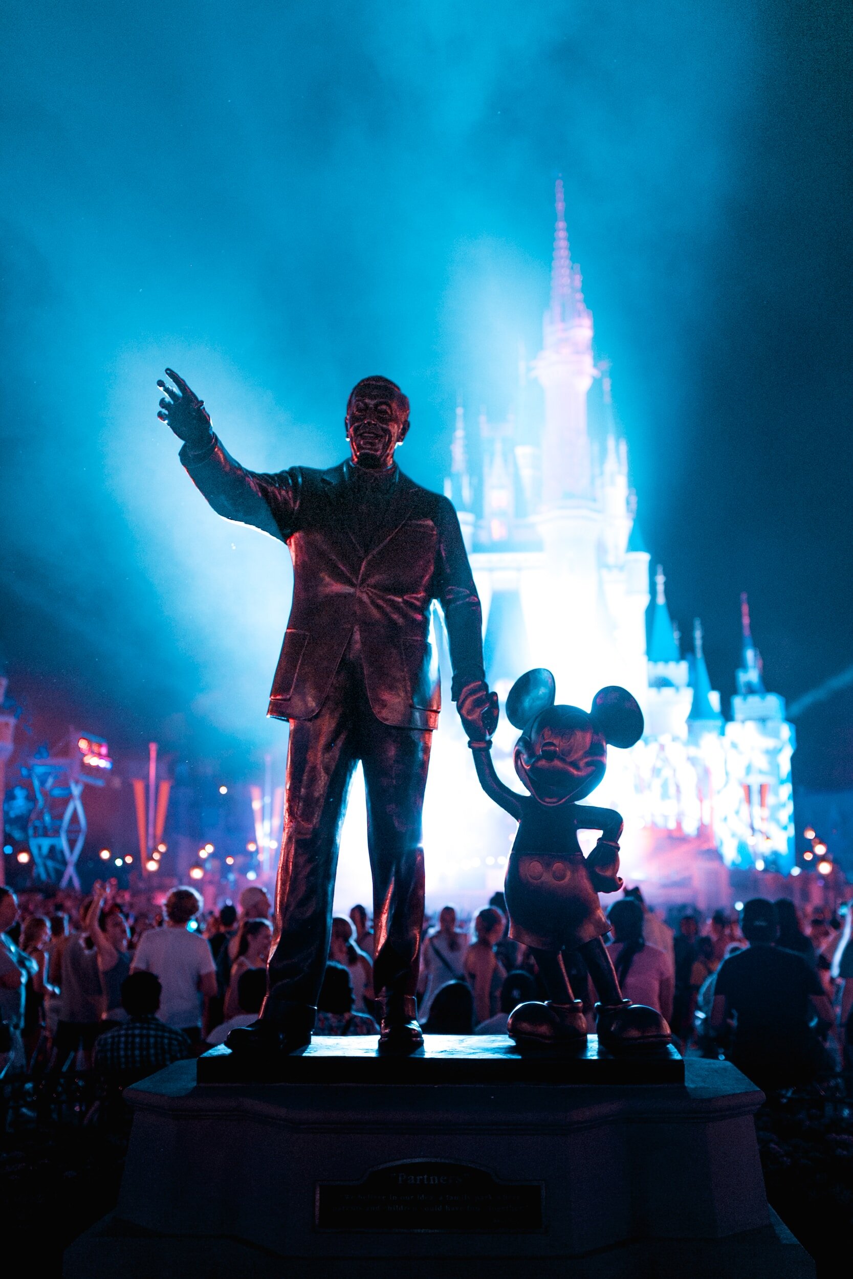 Partners statue and Cinderella Castle at night